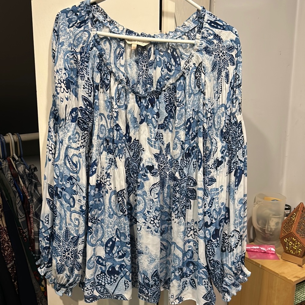 Sheer long sleeve shirt.